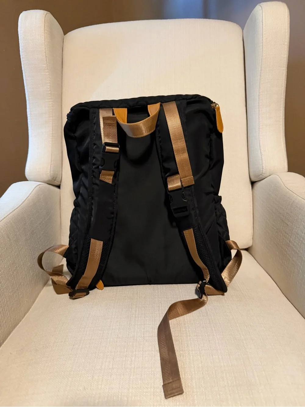 Quilted Black Women's Backpack with Tan Trim Accents